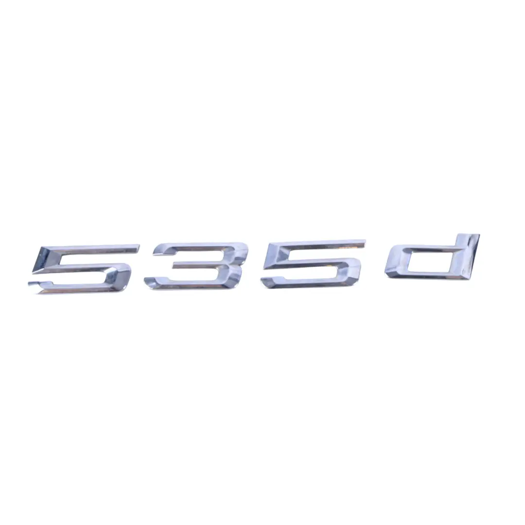 Emblemat Napis Klapy 535D do BMW F10 o numerze 7219550 BMW F10 Emblemat Napis Klapy 535D - SKU 7219550 - Numer Części 7219550