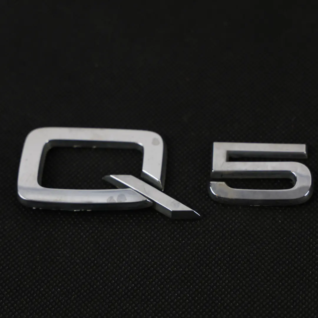 Bootlid Emblem Logo Model Badge Chrome to Audi Q5 FY Tailgate with Part number 80A071803 Audi Q5 FY Tailgate Bootlid Emblem Logo Model Badge Chrome - SKU 80A071803 - Part number 80A071803