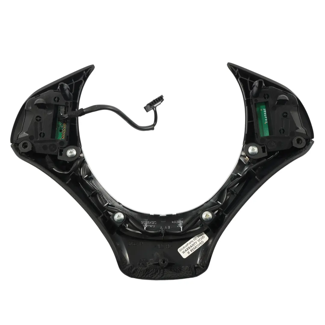 Cubierta Moldura Interruptor Multifuncion Volante Deportivo 9133466 para BMW E70 con número de pieza 9249142 BMW E70 Cubierta Moldura Interruptor Multifuncion Volante Deportivo 9133466 - SKU 9249142 - Número de pieza 9249142