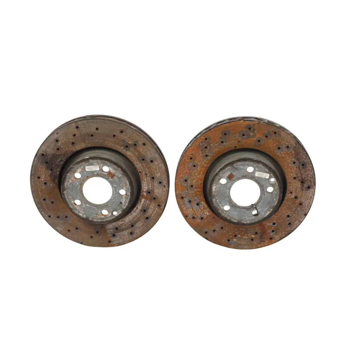 W207 W212 Brake Disc Set Front Wheel Left Right N/O/S Perforated to Mercedes with Part number A0004213012 Mercedes W207 W212 Brake Disc Set Front Wheel Left Right N/O/S Perforated - SKU A0004213012 - Part number A0004213012