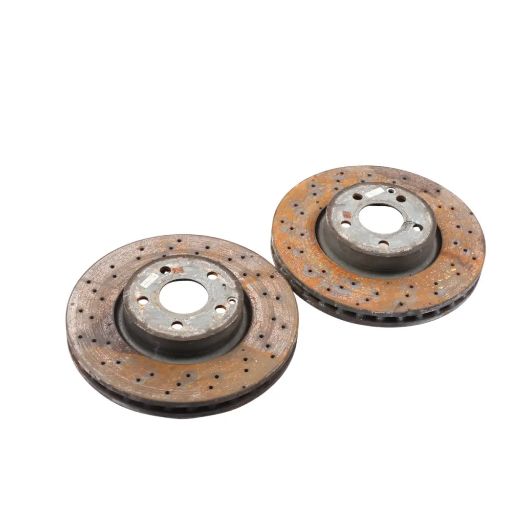 W207 W212 Brake Disc Set Front Wheel Left Right N/O/S Perforated to Mercedes with Part number A0004213012 Mercedes W207 W212 Brake Disc Set Front Wheel Left Right N/O/S Perforated - SKU A0004213012 - Part number A0004213012
