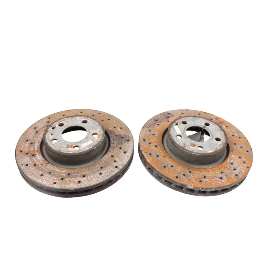 W207 W212 Brake Disc Set Front Wheel Left Right N/O/S Perforated to Mercedes with Part number A0004213012 Mercedes W207 W212 Brake Disc Set Front Wheel Left Right N/O/S Perforated - SKU A0004213012 - Part number A0004213012