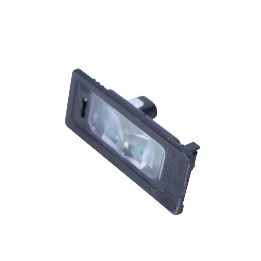 Jaguar XE XF Lampka Tablicy Rejectracyjnej do Land Rover L550 o numerze GX73-13B627-AB Land Rover L550 Jaguar XE XF Lampka Tablicy Rejectracyjnej - SKU GX73-13B627-AB - Numer Części GX73-13B627-AB