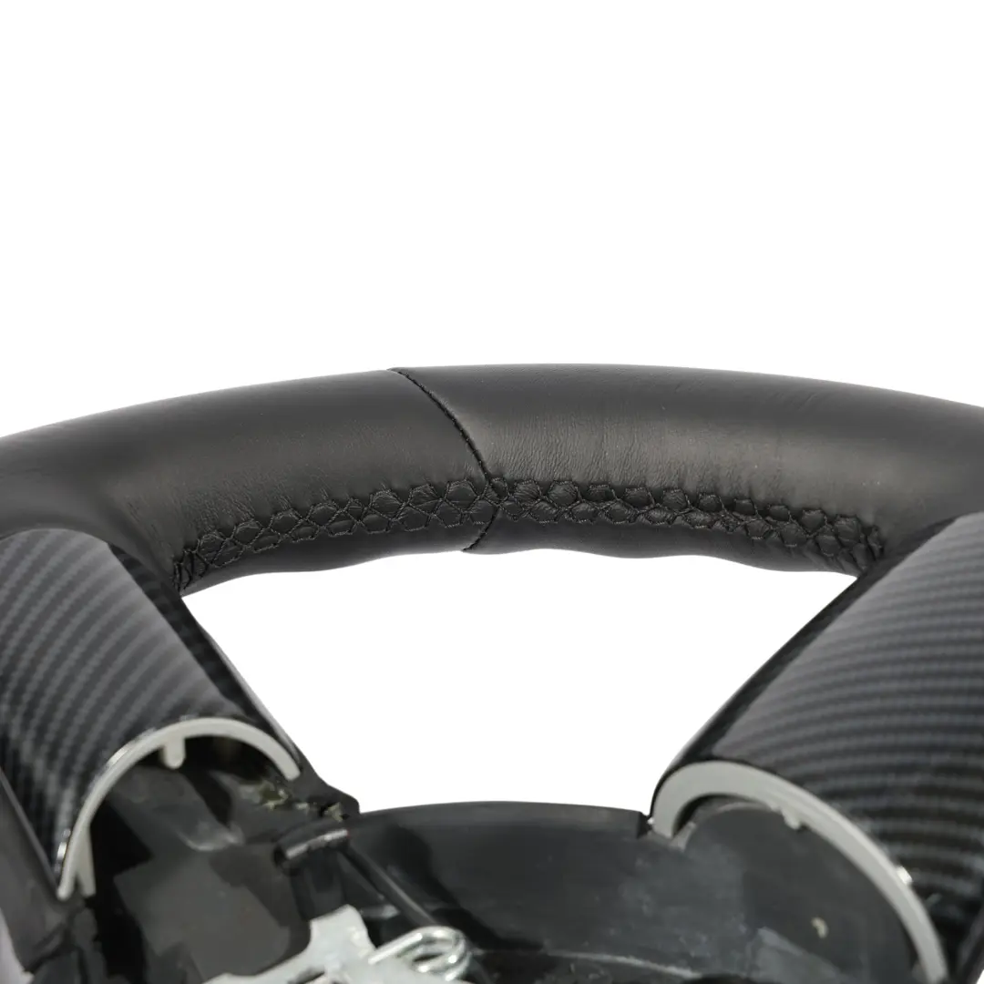 Pelle Nera Carbon Look per Mini Cooper R50 R52 R53 JCW Volante In con numero di parte 0397016 Mini Cooper R50 R52 R53 JCW Volante In Pelle Nera Carbon Look - SKU 0397016 - Numero di parte 0397016