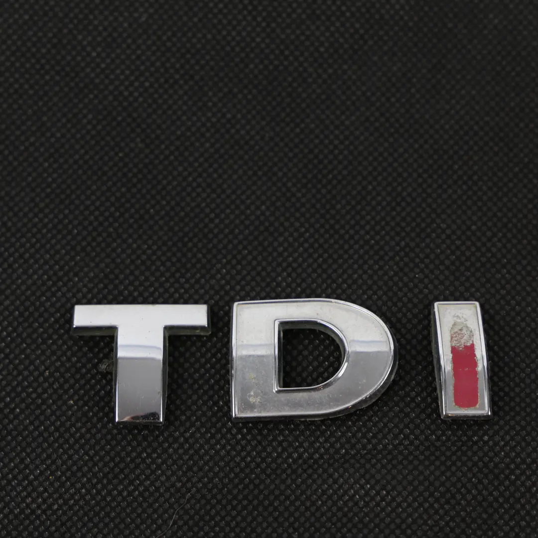 Volkswagen Transporter T5 Emblema Insignia TDI Maletero Tapa - SKU 3B0853675AC - Número de pieza 3B0853675AC