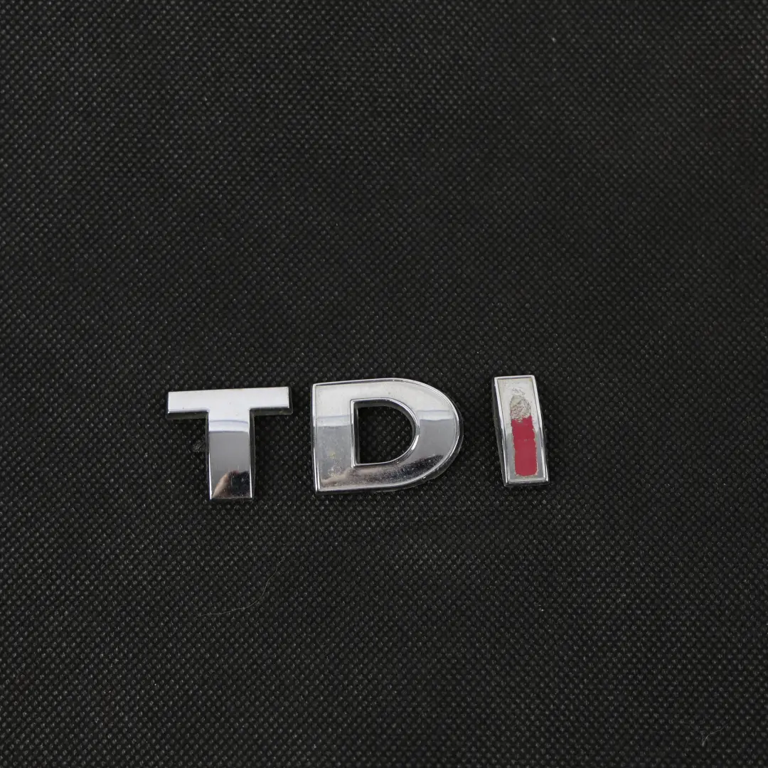 Emblema Badge TDI Bagagliaio Scritta per Volkswagen Transporter T5 con numero di parte 3B0853675AC Volkswagen Transporter T5 Emblema Badge TDI Bagagliaio Scritta - SKU 3B0853675AC - Numero di parte 3B0853675AC