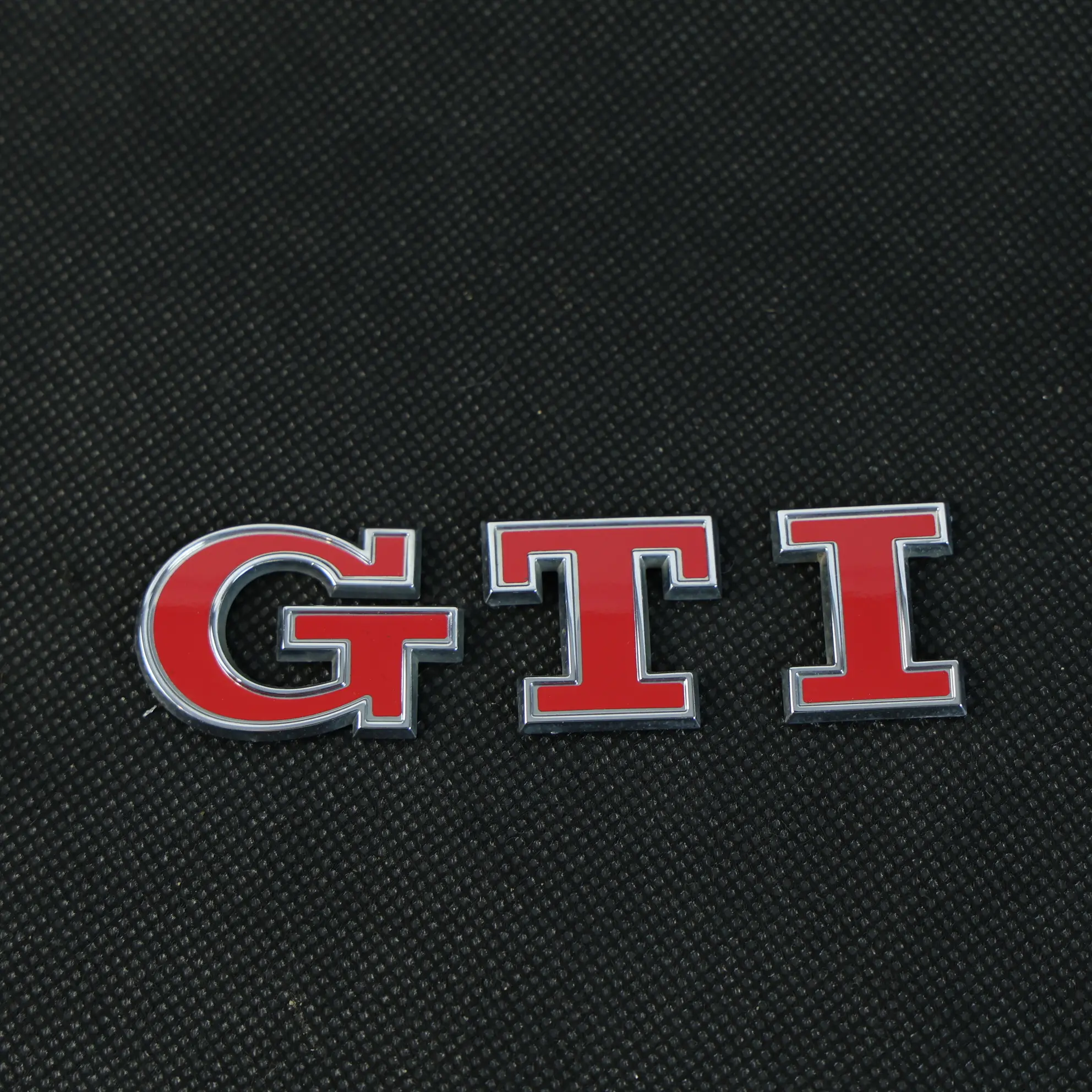 Volkswagen Golf GTI 5G Emblema Logo Posteriore Scritta GTI 5G0853675AC