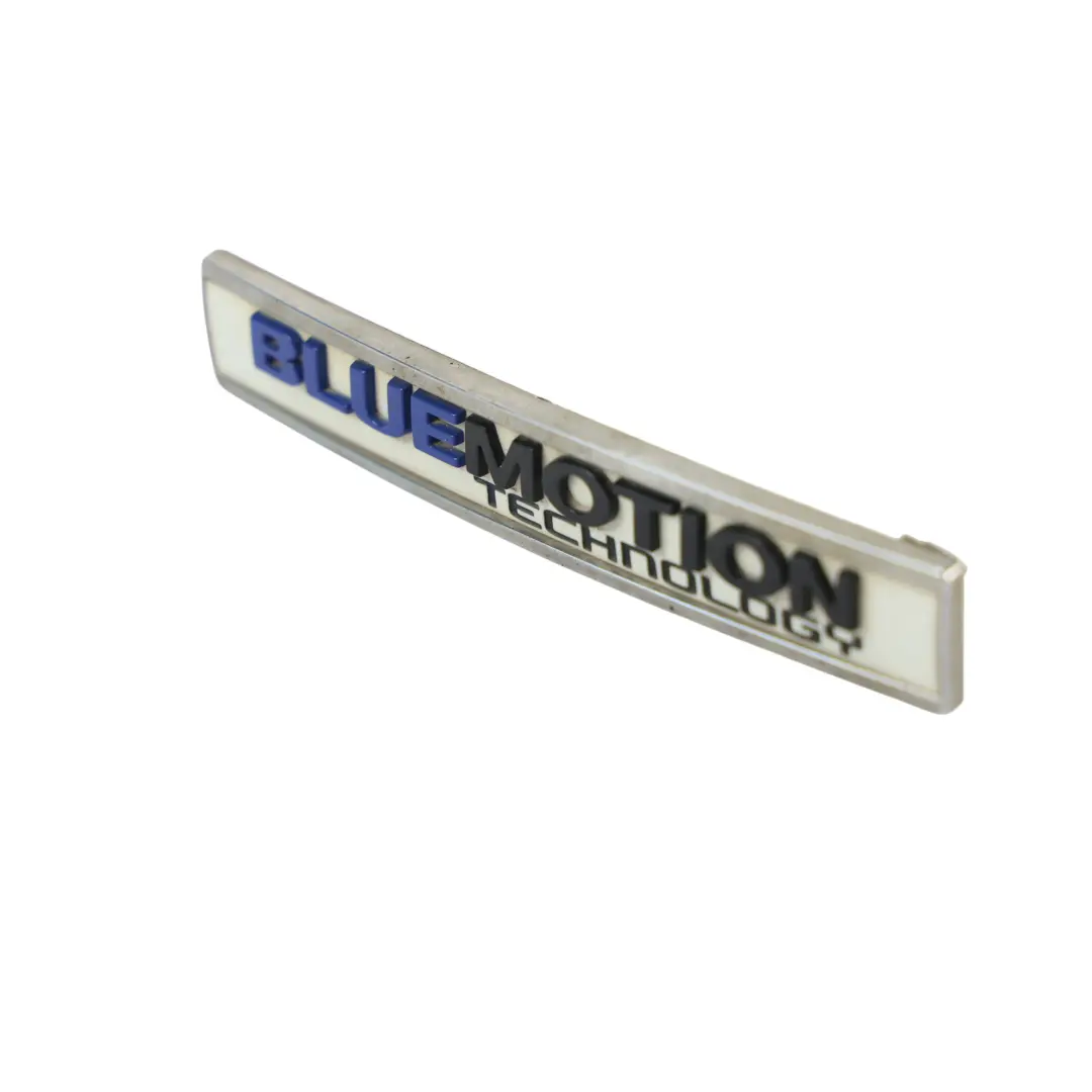 Emblemat Napis Klapy Tylnej BlueMotion do Volkswagen Tiguan 5N o numerze 5N0853675M Volkswagen Tiguan 5N Emblemat Napis Klapy Tylnej BlueMotion - SKU 5N0853675M - Numer Części 5N0853675M