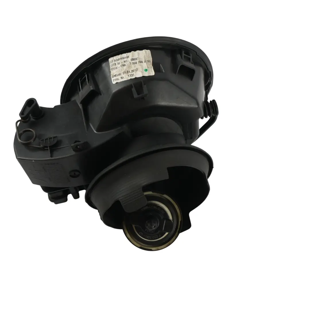 Copertura Alloggiamento Sportello Carburante per Mini F57 con numero di parte 7356768 Mini F57 Copertura Alloggiamento Sportello Carburante - SKU 7356768 - Numero di parte 7356768