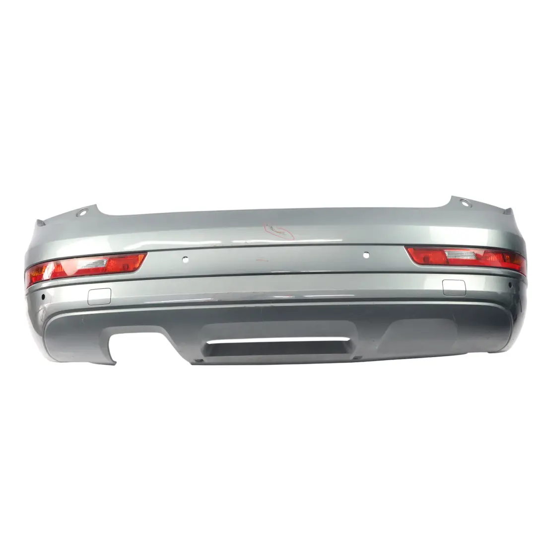 Bumper Covering Trim Panel Monsoon Grey Metallic - X7R to Audi Q3 8U Rear with Part number 8U0807067F Audi Q3 8U Rear Bumper Covering Trim Panel Monsoon Grey Metallic - X7R - SKU 8U0807067F-MOG - Part number 8U0807067F