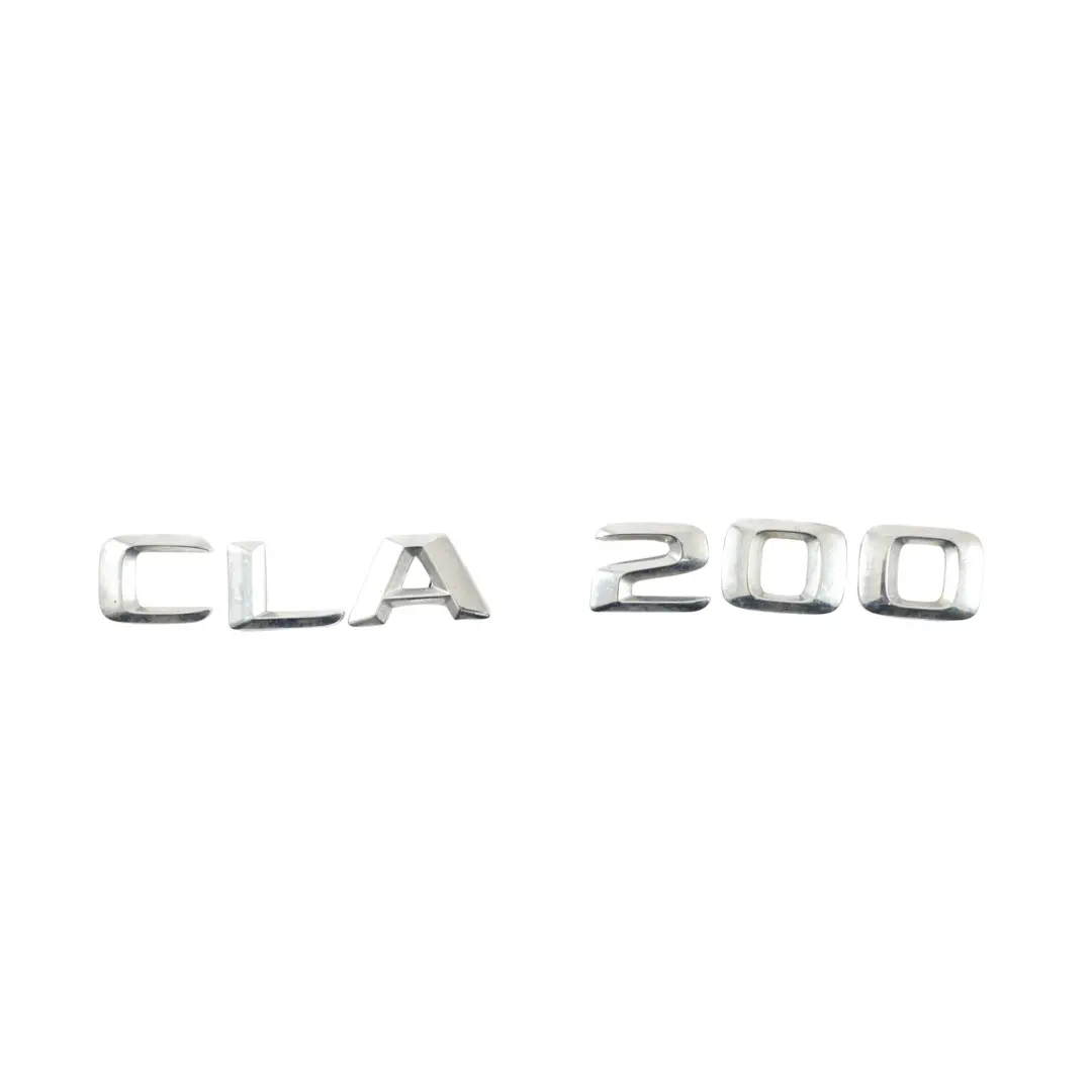 Emblemat Napis Logo Tylnej Klapy CLA 200 do Mercedes C117 o numerze A1178171015 Mercedes C117 Emblemat Napis Logo Tylnej Klapy CLA 200 - SKU A1178171015 - Numer Części A1178171015