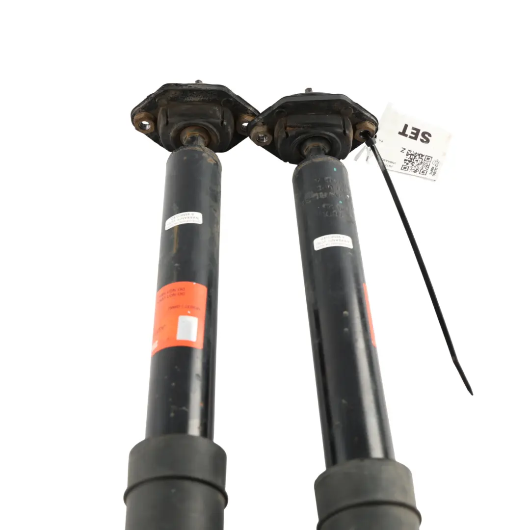 BMW E81 E82 E87 Rear Axle Shock Absorber Strut Left Right N/O/S Set - SKU JGT1168S - Part number JGT1168S