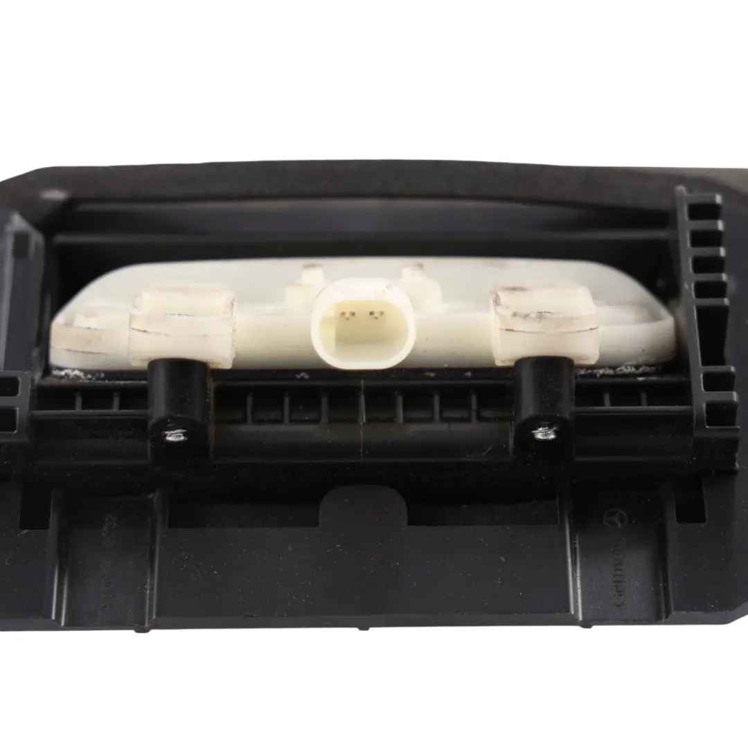 Number Plate Light Surround Trim Panel to Mercedes C218 Rear with Part number A2187500393 Mercedes C218 Rear Number Plate Light Surround Trim Panel - SKU A2187500393 - Part number A2187500393