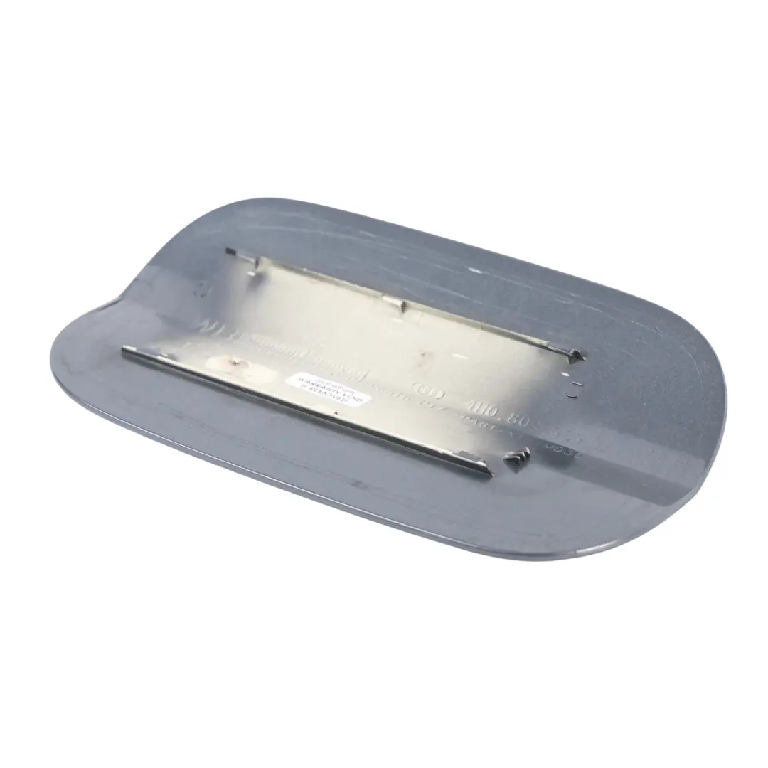 Sportello Tappo Serbatoio Carburante Grigio Monsone X7R per Audi A8 D4 con numero di parte 4H0809909B Audi A8 D4 Sportello Tappo Serbatoio Carburante Grigio Monsone X7R - SKU 4H0809909B-MOG - Numero di parte 4H0809909B