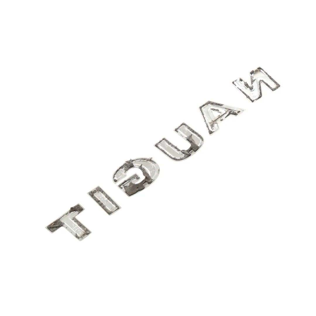 Volkswagen Tiguan 5N Heck Heckklappe Emblem Logo Schriftzug - SKU 5NA853687 - Teilenummer 5NA853687