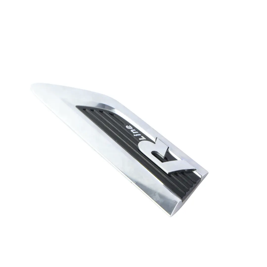 R-Line Front Wing Badge Trim Right O/S to Volkswagen Tiguan 5N with Part number 5NA853688B Volkswagen Tiguan 5N R-Line Front Wing Badge Trim Right O/S - SKU 5NA853688B - Part number 5NA853688B