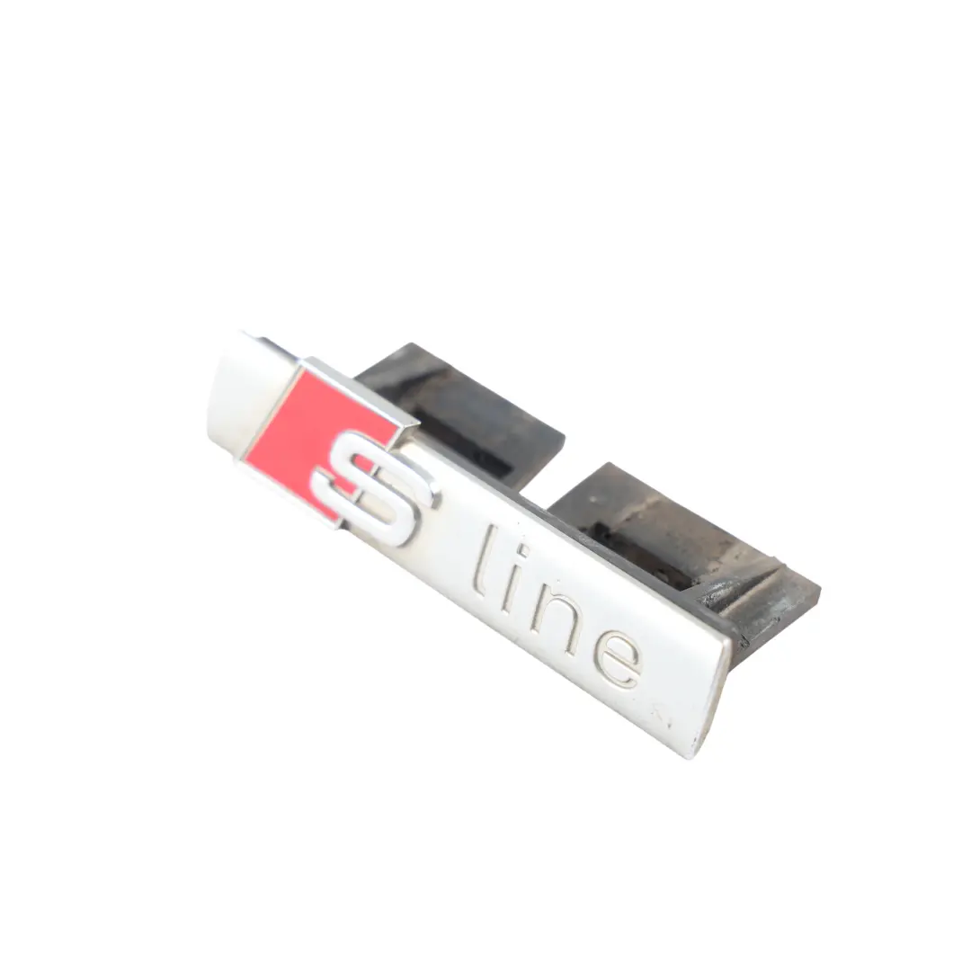 Audi A4 S4 B7 Emblemat Napis Logo Przedniego Grilla S-Line - SKU 8E0853736C - Numer Części 8E0853736C