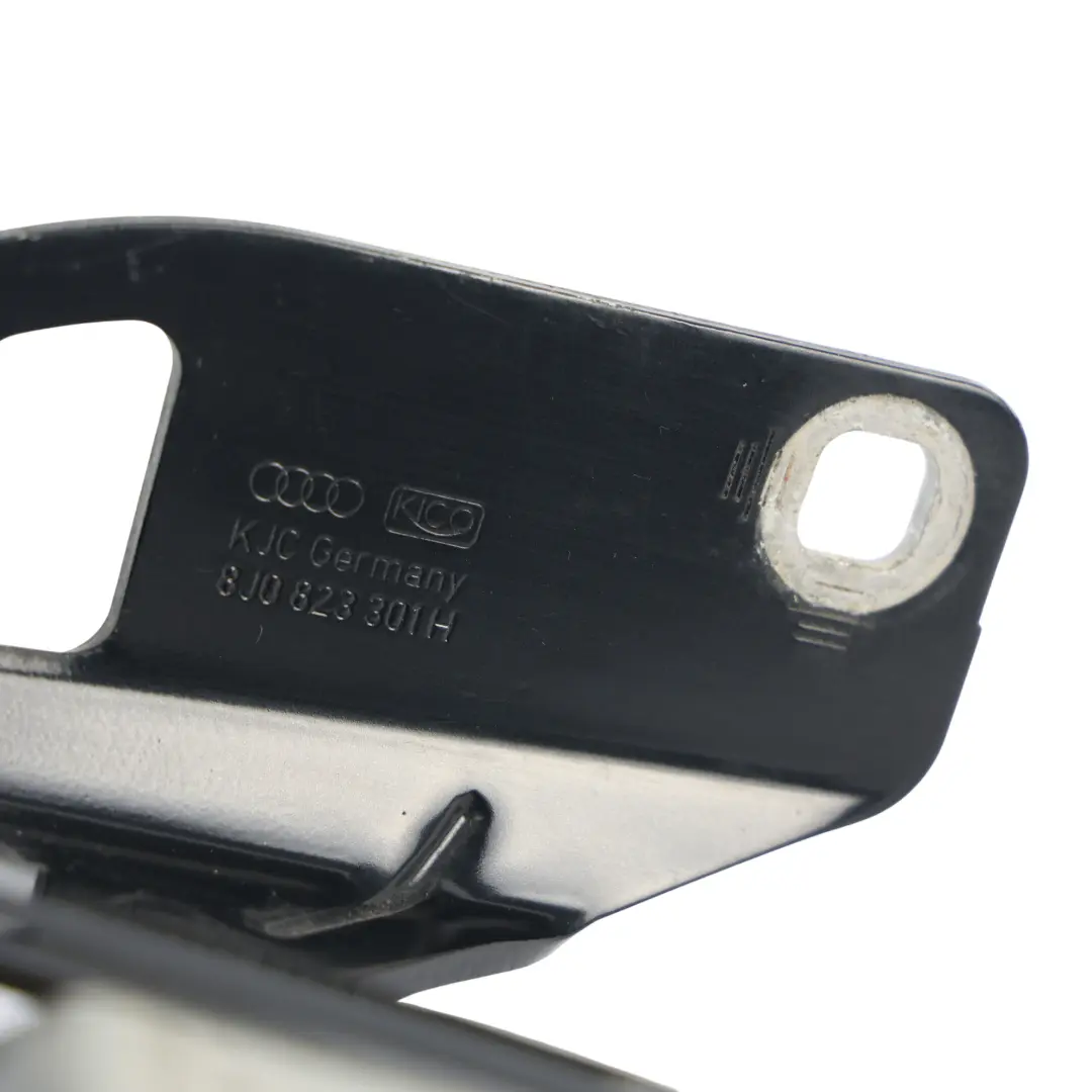 Motorhaube Scharnier Vorne Links Phantom Schwarz Z9Y für Audi TT 8J mit Teilenummer 8J0823301H Audi TT 8J Motorhaube Scharnier Vorne Links Phantom Schwarz Z9Y - SKU 8J0823301H-PHB - Teilenummer 8J0823301H