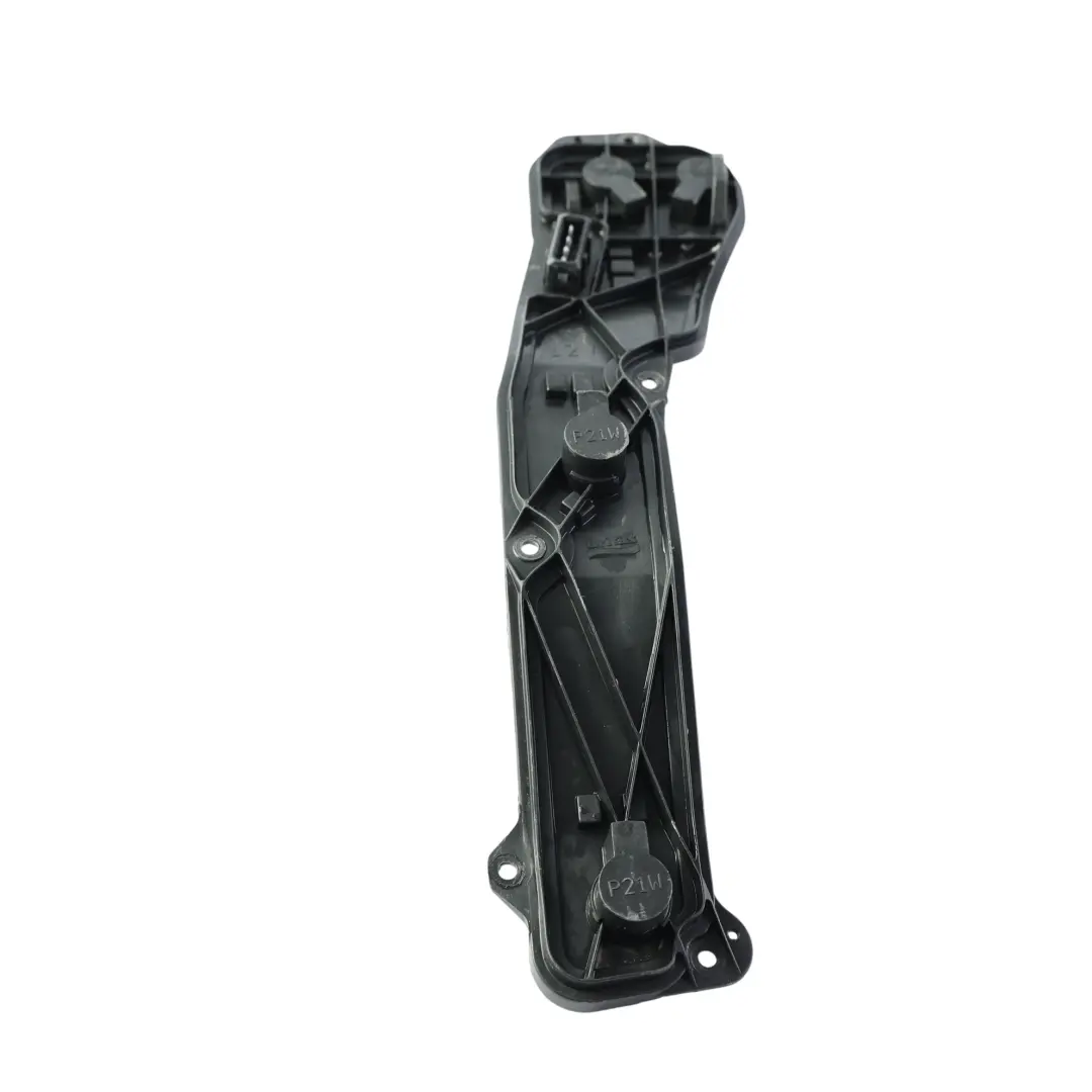 Tail Light Bulb Holder Cover Right O/S to Land Rover Discovery L318 Rear with Part number XFM100320 Land Rover Discovery L318 Rear Tail Light Bulb Holder Cover Right O/S - SKU XFM100320 - Part number XFM100320