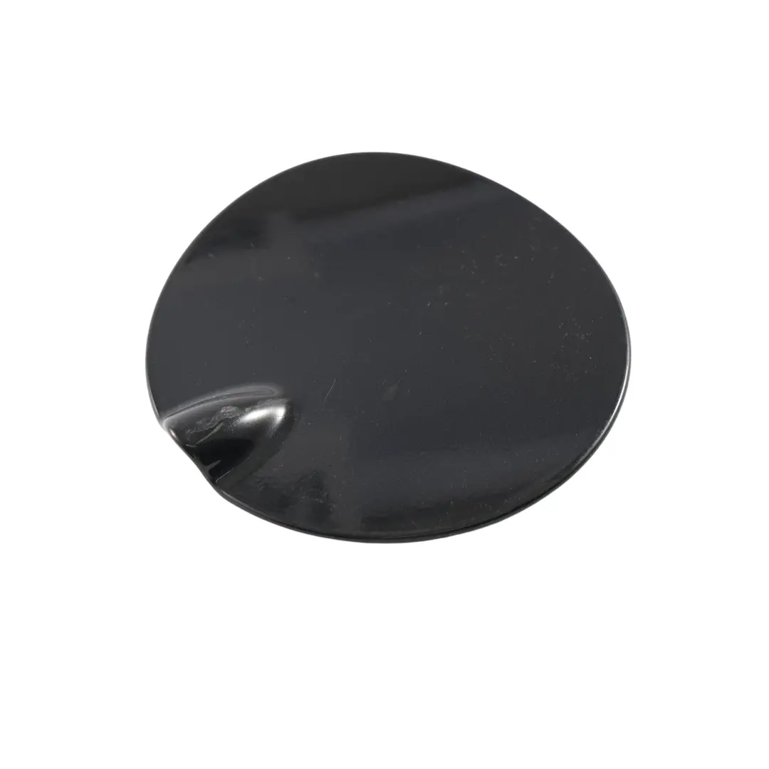 Filler Fill in Flap Cover Cap Panther Black Metallic - D9 to Ford Fiesta MK7 Fuel with Part number D1BB-A405A02-AAW Ford Fiesta MK7 Fuel Filler Fill in Flap Cover Cap Panther Black Metallic - D9 - SKU D1BB-A405A02-AAW-PBL - Part number D1BB-A405A02-AAW
