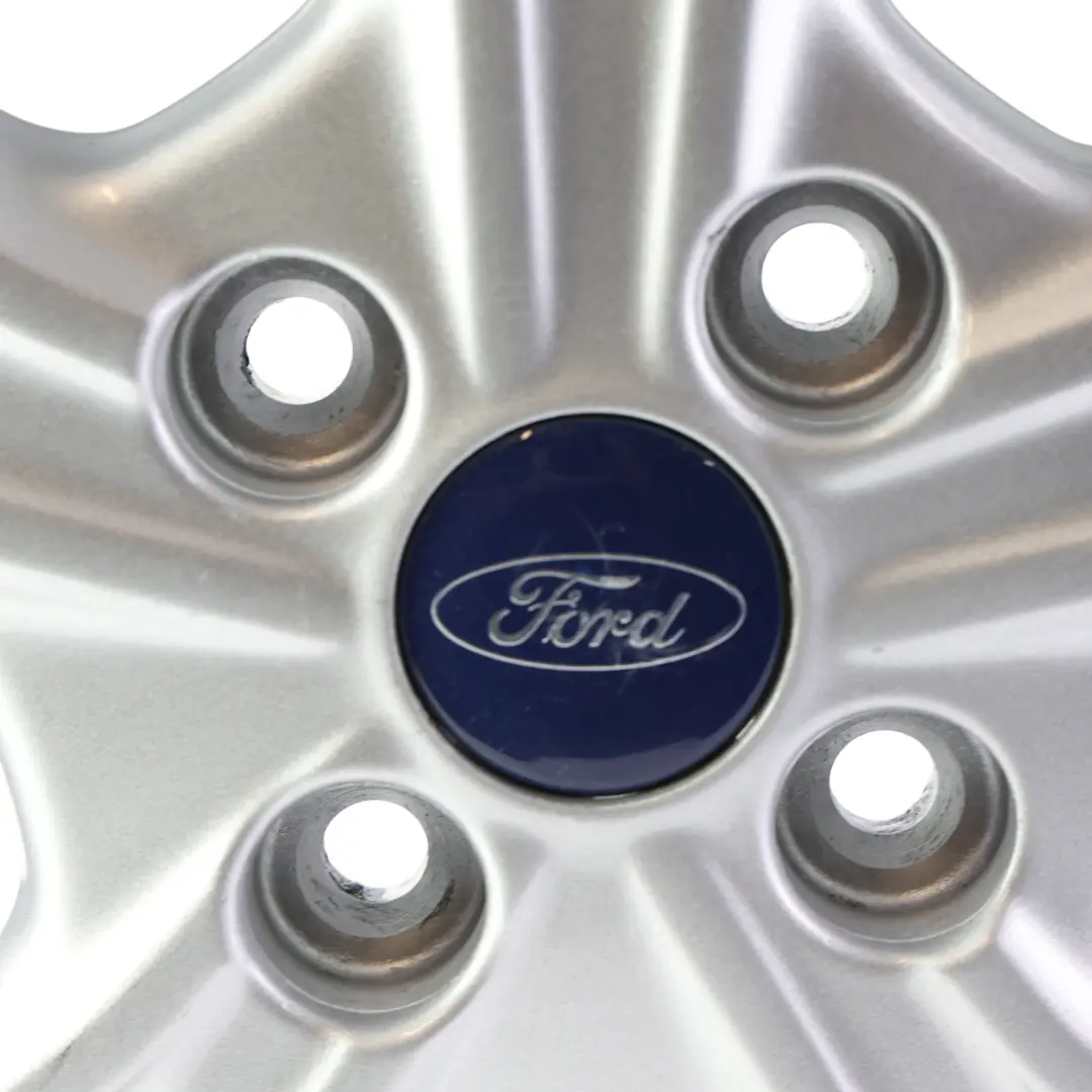 Silberne Felge 15" 6J ET:47.5 für Ford Fiesta Mk7 mit Teilenummer E1BJ-1007-AA Ford Fiesta Mk7 Silberne Felge 15" 6J ET:47.5 - SKU E1BJ-1007-AA-1 - Teilenummer E1BJ-1007-AA