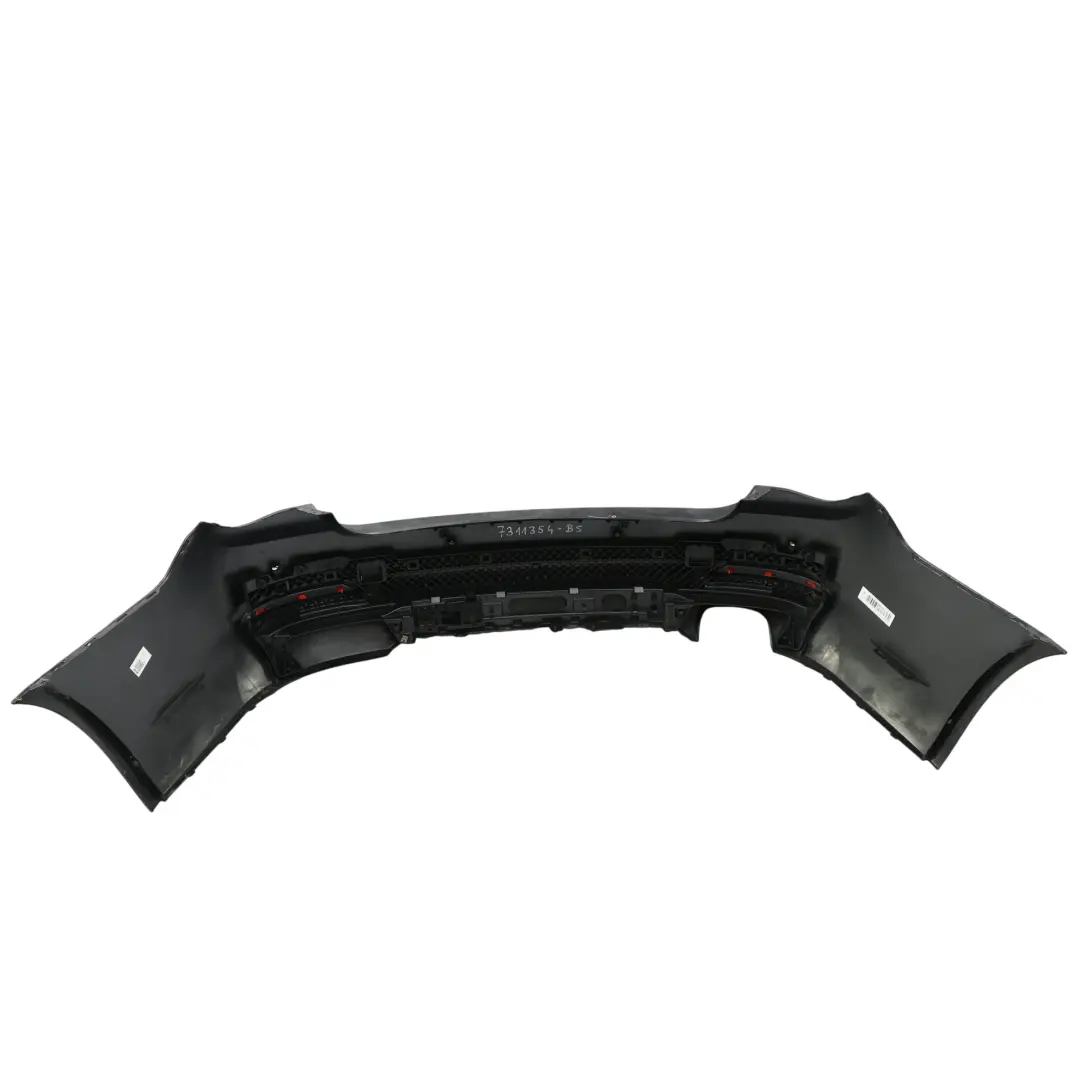 Zderzak Tylny Black Sapphire Czarny Metalik - 475 do BMW F01 LCI o numerze 7311354 BMW F01 LCI Zderzak Tylny Black Sapphire Czarny Metalik - 475 - SKU 7311354-BS - Numer Części 7311354