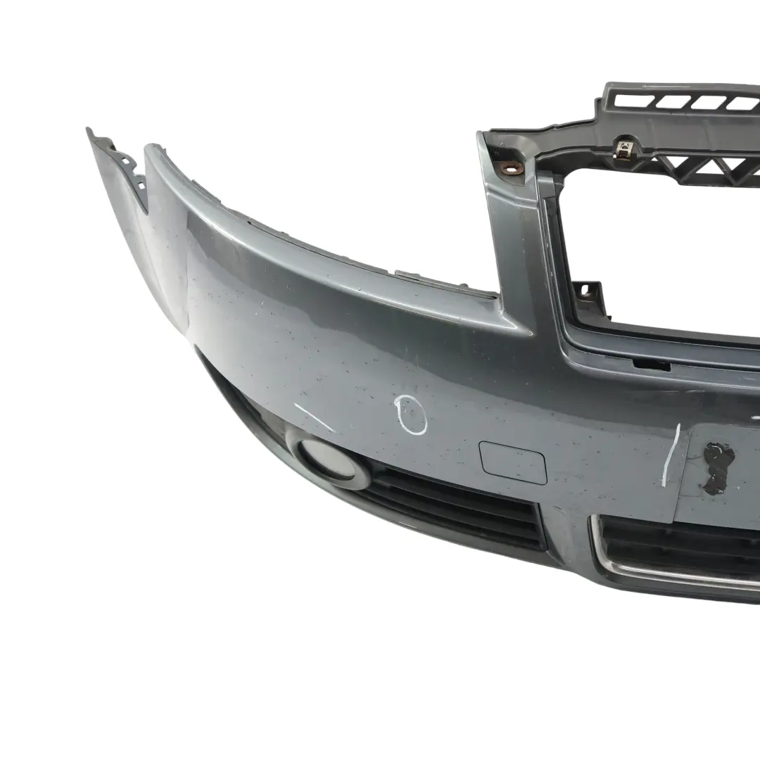 Pokrywa Zderzaka Przedniego Szary Delfin Metalik X7Z do Audi A4 B6 o numerze 8H0807105 Audi A4 B6 Pokrywa Zderzaka Przedniego Szary Delfin Metalik X7Z - SKU 8H0807105-DGM - Numer Części 8H0807105