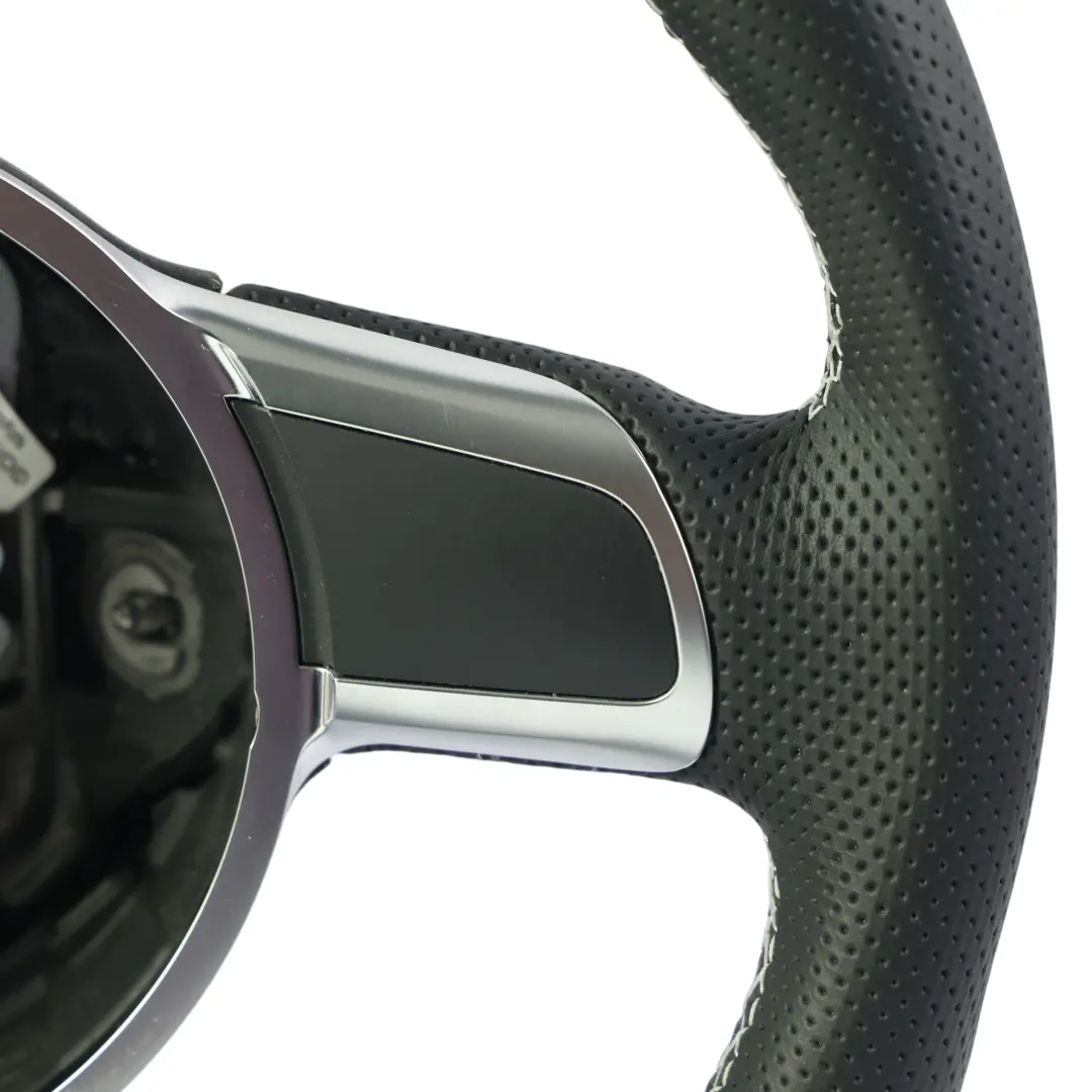 Kierownica NOWA Czarna Skóra Ścięta Białe Nici do Audi TT 8J o numerze 8J0419091 Audi TT 8J Kierownica NOWA Czarna Skóra Ścięta Białe Nici - SKU 8J0419091-2 - Numer Części 8J0419091
