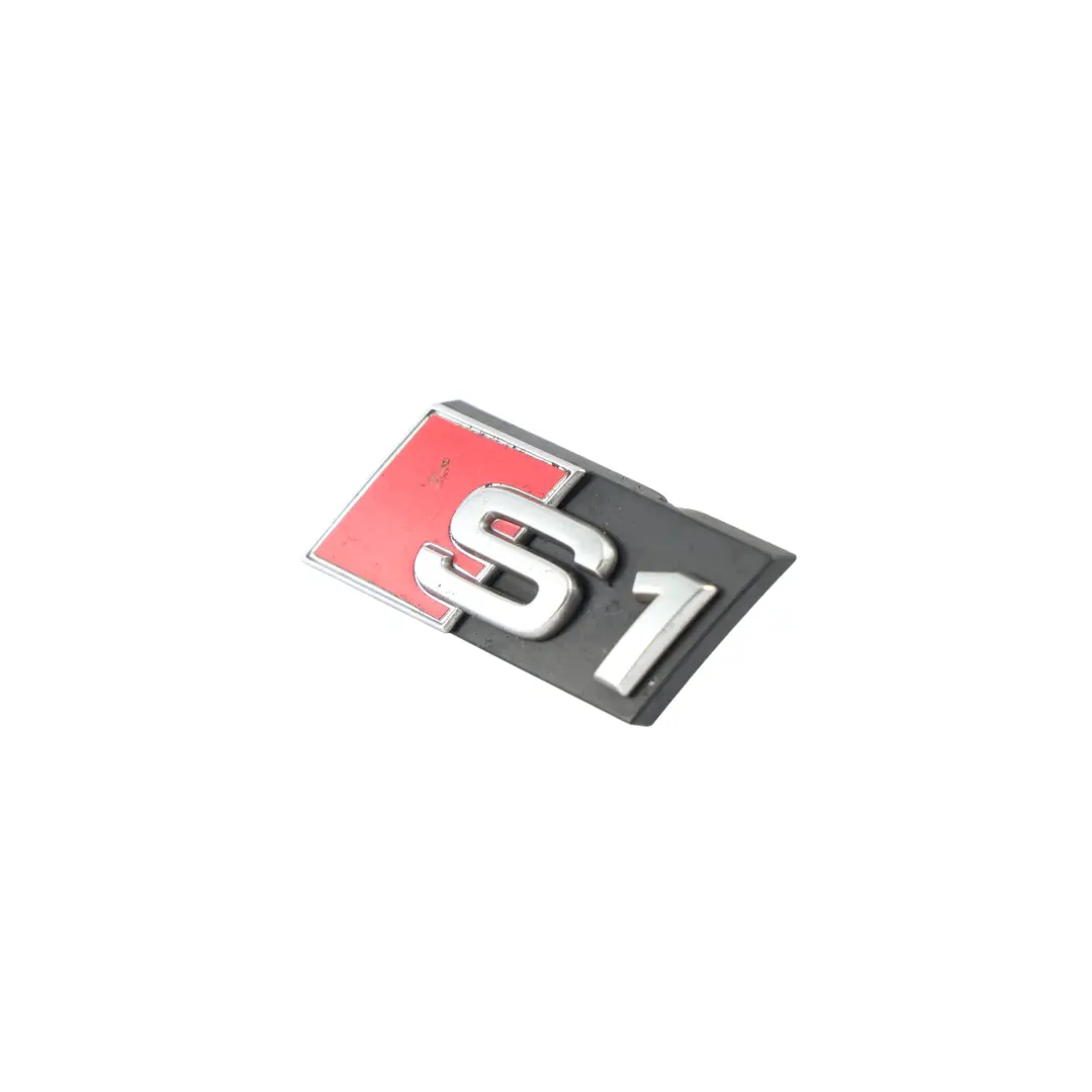 Audi S1 8X Emblema Parachoques Delantero Insignia Letras S1 - SKU 8X0853736A - Número de pieza 8X0853736A