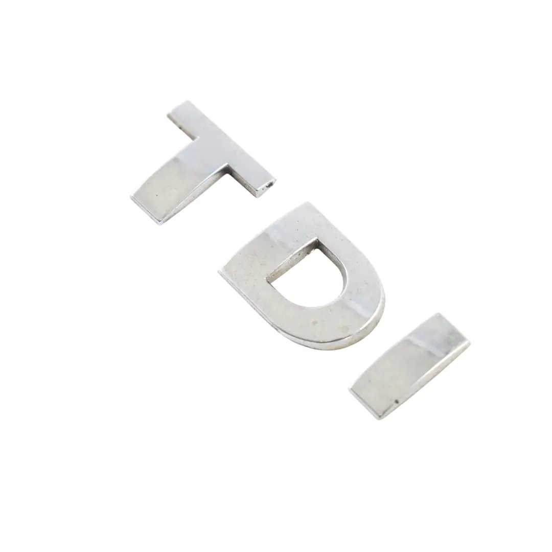 Heckklappe Emblem Schriftzug TDI für Volkswagen Transporter T5 Caddy C20 mit Teilenummer 3B0853675AB Volkswagen Transporter T5 Caddy C20 Heckklappe Emblem Schriftzug TDI - SKU 3B0853675AB - Teilenummer 3B0853675AB