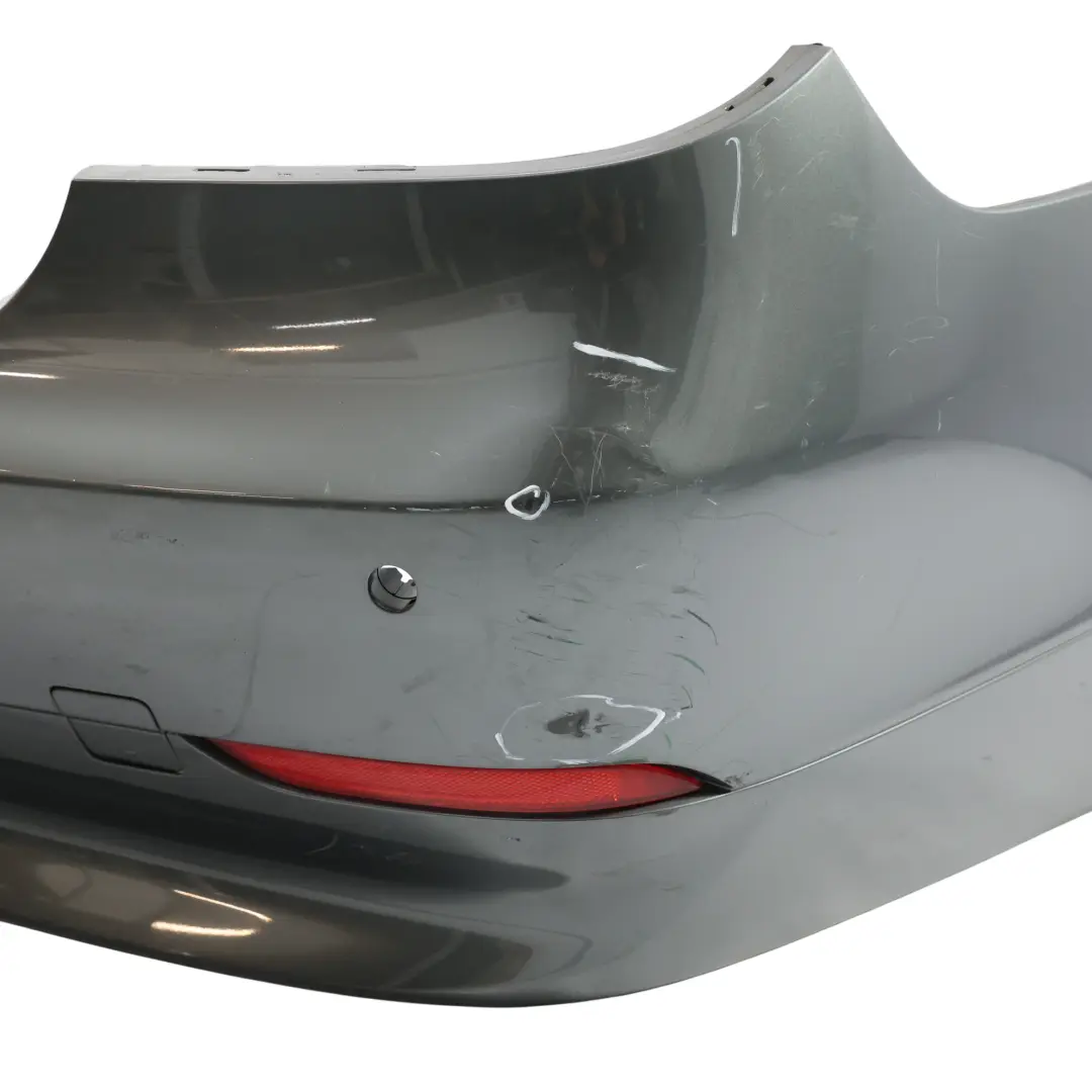 Tylny Zderzak PDC Titangrau II Titanium Szary Metalik - A36 do BMW E60 o numerze 7077940 BMW E60 Tylny Zderzak PDC Titangrau II Titanium Szary Metalik - A36 - SKU 7077940-TGR - Numer Części 7077940