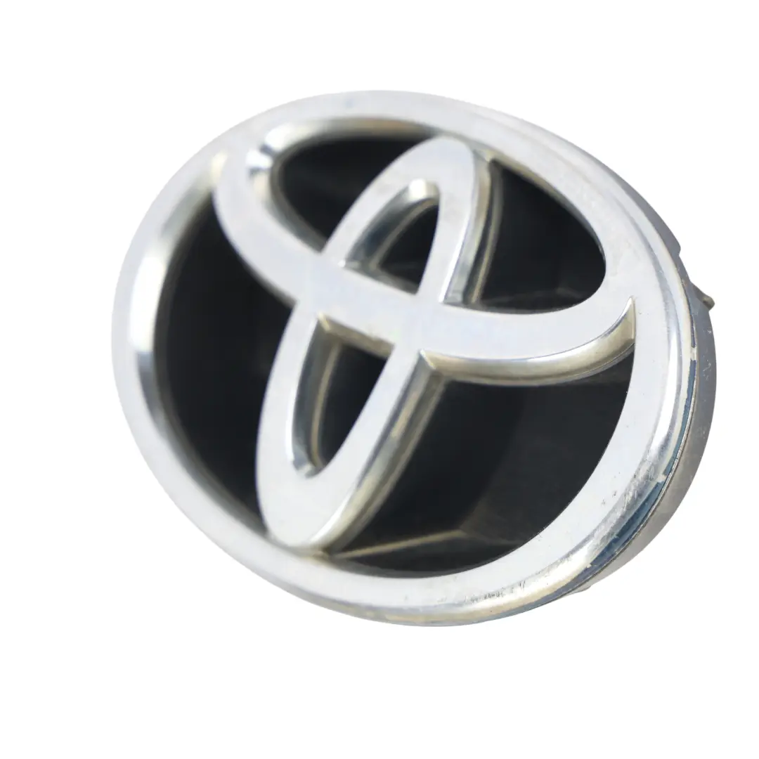 Toyota Corolla E12 Rejilla Radiador Delantera Emblema Logo - SKU 7531102120 - Número de pieza 7531102120