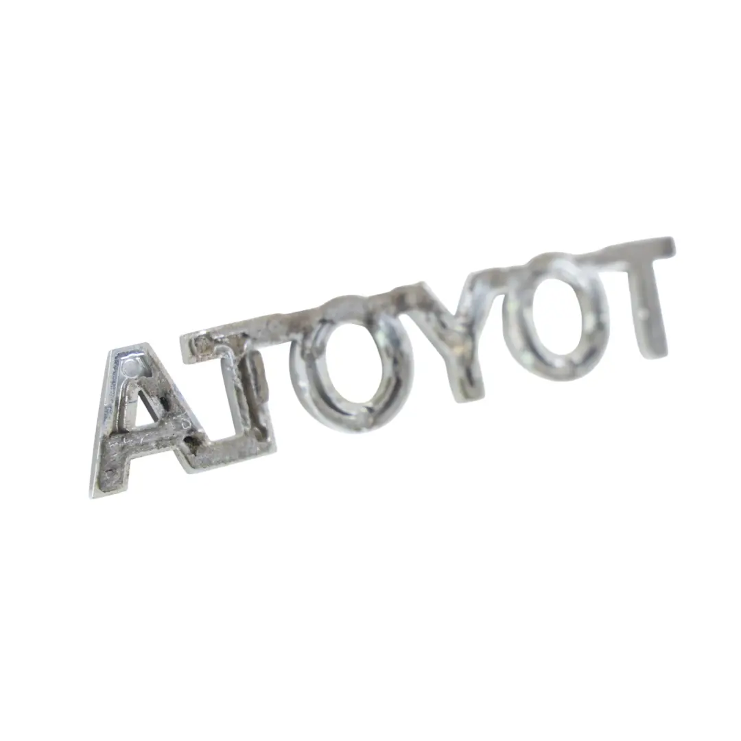 Emblemat Klapy Tylnej Napis Tabliczka do Toyota Verso R2 o numerze 754410F020 Toyota Verso R2 Emblemat Klapy Tylnej Napis Tabliczka - SKU 754410F020 - Numer Części 754410F020