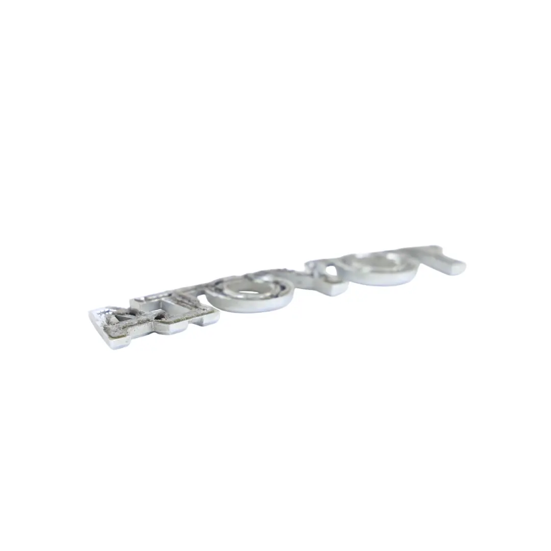 Emblemat Klapy Tylnej Napis Tabliczka do Toyota Verso R2 o numerze 754410F020 Toyota Verso R2 Emblemat Klapy Tylnej Napis Tabliczka - SKU 754410F020 - Numer Części 754410F020