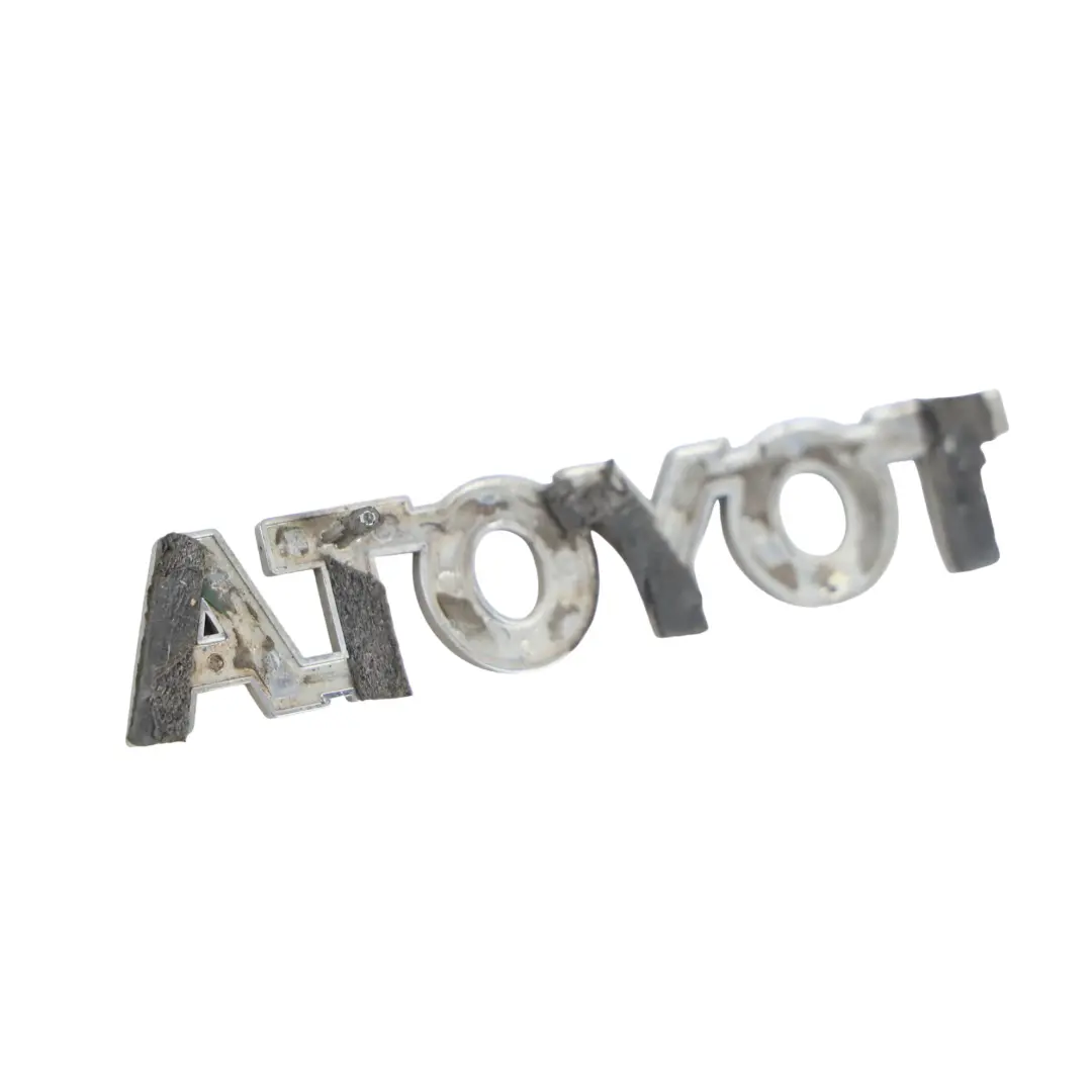 Toyota Aygo B1 Mk1 Scritta Stemma Portellone Posteriore Bagagliaio 75446-0H010 - SKU 754460H010 - Numero di parte 754460H010