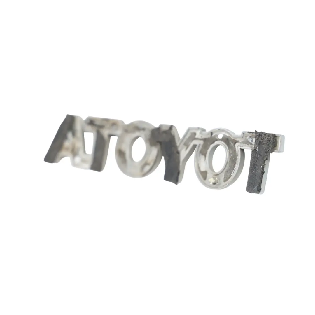 Emblemat Napis Klapy Bagażnika Znaczek Tylny 75446-0H010 do Toyota Aygo B1 o numerze 754460H010 Toyota Aygo B1 Emblemat Napis Klapy Bagażnika Znaczek Tylny 75446-0H010 - SKU 754460H010 - Numer Części 754460H010