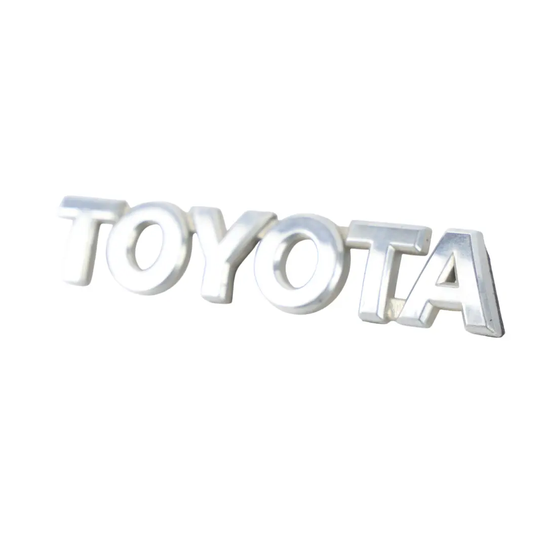 Mk1 Scritta Stemma Portellone Posteriore Bagagliaio 75446-0H010 per Toyota Aygo B1 con numero di parte 754460H010 Toyota Aygo B1 Mk1 Scritta Stemma Portellone Posteriore Bagagliaio 75446-0H010 - SKU 754460H010 - Numero di parte 754460H010