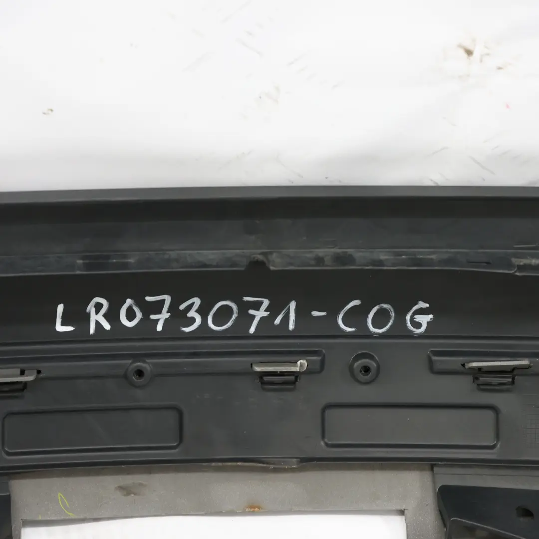 Bumper Cover Corris Grey - 873 to Land Rover Discovery Sport L550 Rear with Part number LR073071 Land Rover Discovery Sport L550 Rear Bumper Cover Corris Grey - 873 - SKU LR073071-COG - Part number LR073071