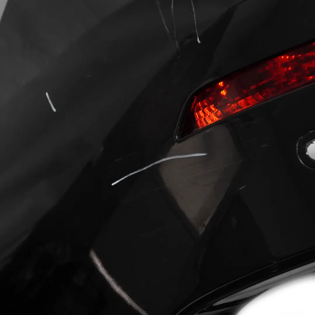 Zderzak Tylny PDC Black Sapphire Czarny Metalik - 475 do BMW X6 E71 o numerze 2147603 BMW X6 E71 Zderzak Tylny PDC Black Sapphire Czarny Metalik - 475 - SKU 2147603-BS - Numer Części 2147603