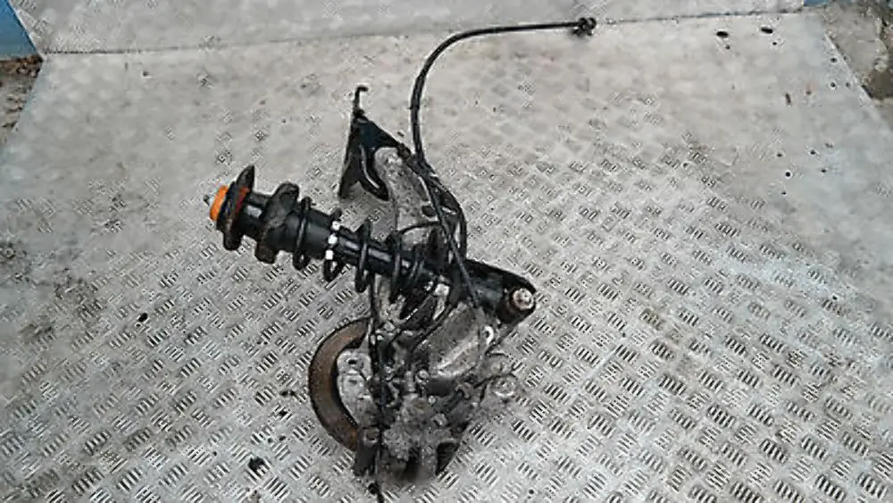 Coupé N12 REAR LEFT SPRING STRUT LEG BRAKE SUSPENSION HUB N/S to BMW Mini R56 One with Part number 22245221 BMW Mini R56 One Coupé N12 REAR LEFT SPRING STRUT LEG BRAKE SUSPENSION HUB N/S - SKU 22245221 - Part number 22245221