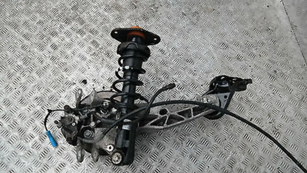 Coupé N12 REAR LEFT SPRING STRUT LEG BRAKE SUSPENSION HUB N/S to BMW Mini R56 One with Part number 22245221 BMW Mini R56 One Coupé N12 REAR LEFT SPRING STRUT LEG BRAKE SUSPENSION HUB N/S - SKU 22245221 - Part number 22245221