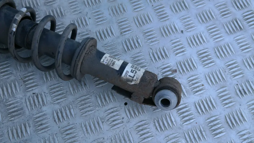 Left Spring Strut Suspension Shock Absorber to BMW Mini R56 Cooper Coupe Rear with Part number 22246789 BMW Mini R56 Cooper Coupe Rear Left Spring Strut Suspension Shock Absorber - SKU 22246789 - Part number 22246789