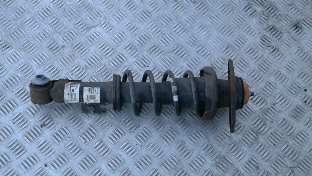 Left Spring Strut Suspension Shock Absorber to BMW Mini R56 Cooper Coupe Rear with Part number 22246789 BMW Mini R56 Cooper Coupe Rear Left Spring Strut Suspension Shock Absorber - SKU 22246789 - Part number 22246789