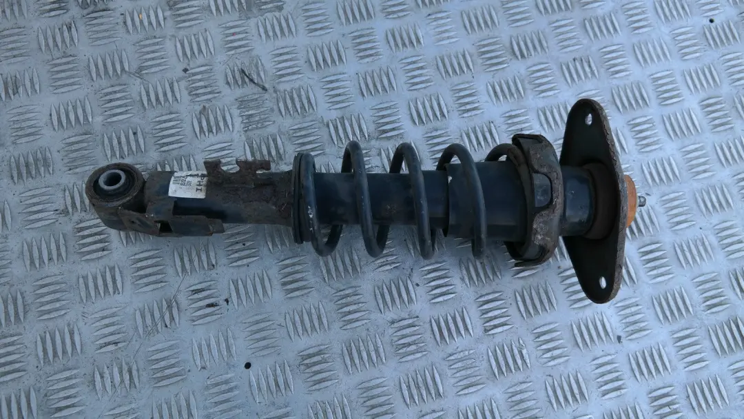 Left Spring Strut Suspension Shock Absorber to BMW Mini R56 Cooper Coupe Rear with Part number 22246789 BMW Mini R56 Cooper Coupe Rear Left Spring Strut Suspension Shock Absorber - SKU 22246789 - Part number 22246789