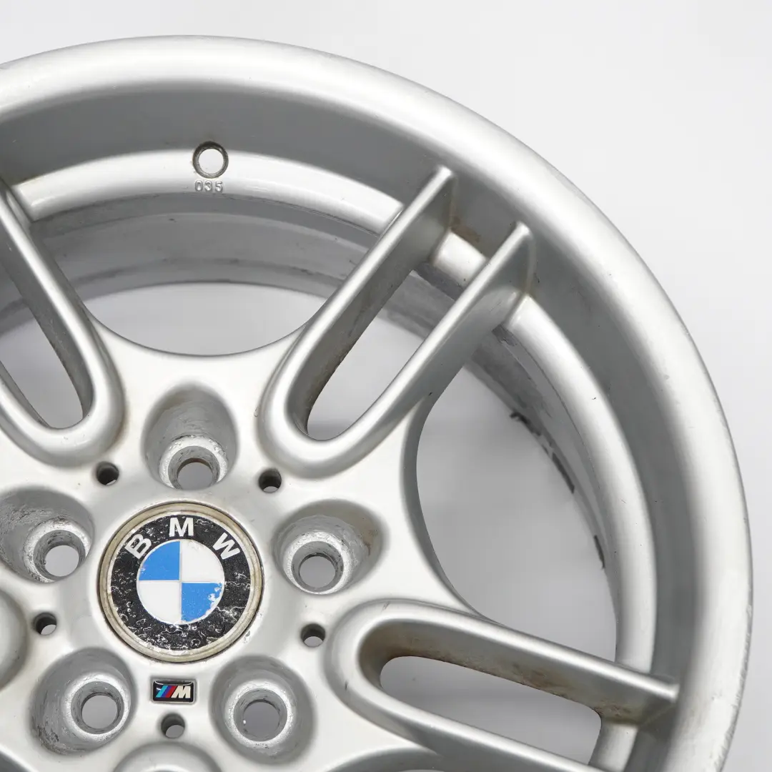 Cerchio posteriore lega argento 17" 9J ET:26 M Raggi paralleli per BMW E39 con numero di parte 2229035 BMW E39 Cerchio posteriore lega argento 17" 9J ET:26 M Raggi paralleli - SKU 2229035-1 - Numero di parte 2229035