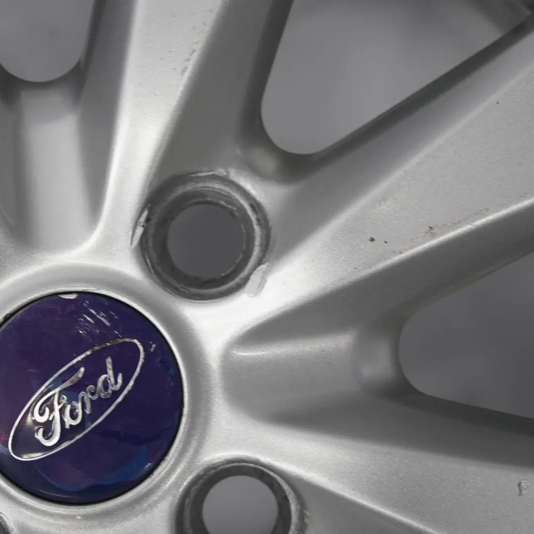 Ford Fiesta MK7 Silver Alloy Wheel Rim 15" 6J ET:47,5 7-Hole 8V21-1007-GA - SKU 2237332-2 - Part number 2237332