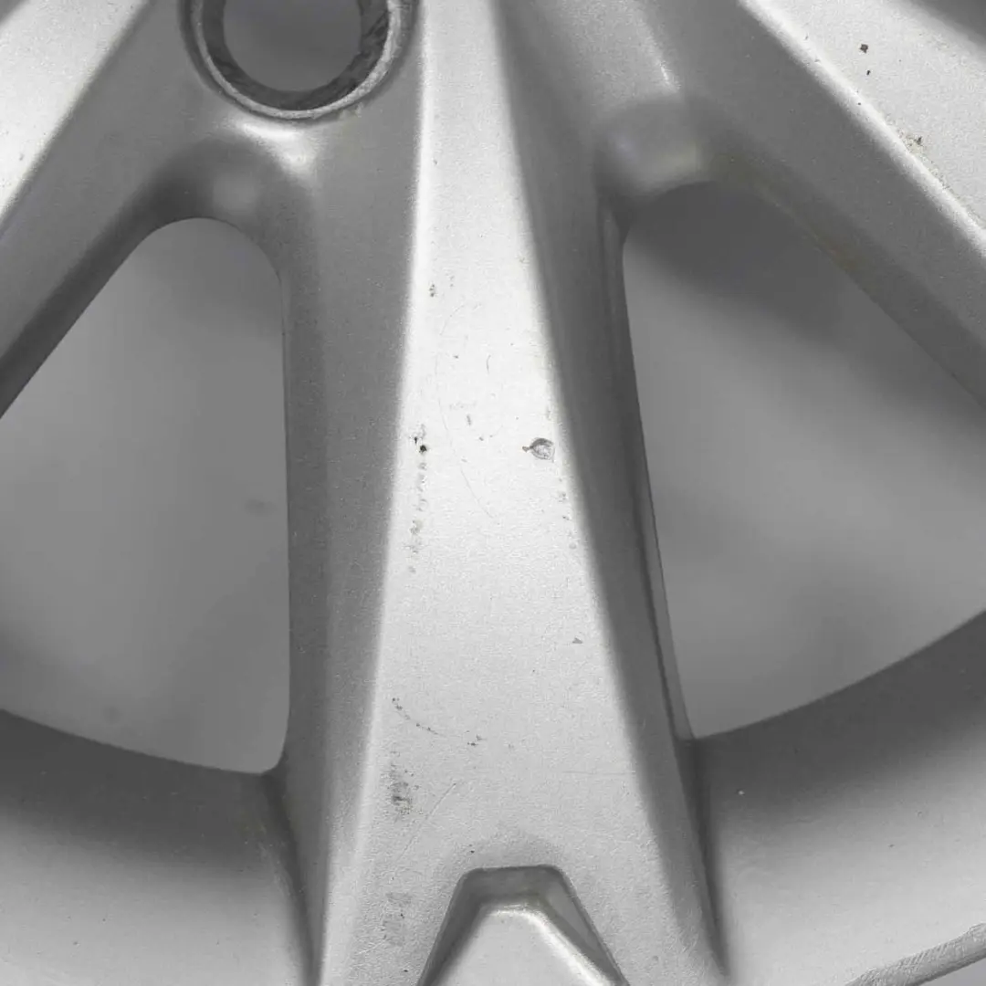 Silberne Leichtmetallfelge 15" 6J ET:47,5 7-Loch 8V21-1007-GA für Ford Fiesta MK7 mit Teilenummer 2237332 Ford Fiesta MK7 Silberne Leichtmetallfelge 15" 6J ET:47,5 7-Loch 8V21-1007-GA - SKU 2237332-2 - Teilenummer 2237332