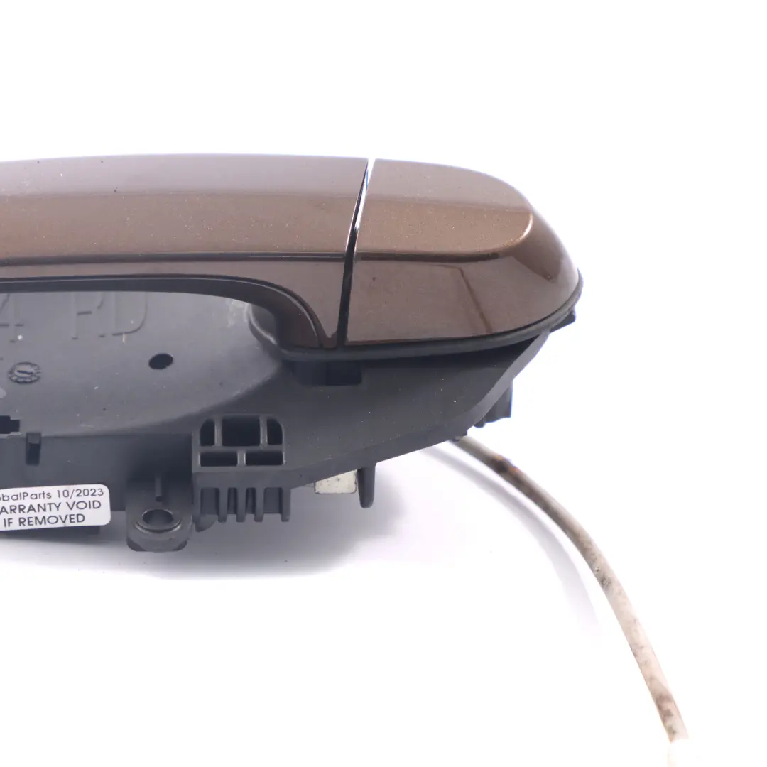 Tirador Puerta Trasera Izquierda Agarre Marrakesh Marrón - B09 para BMW X1 E84 con número de pieza 2992975 BMW X1 E84 Tirador Puerta Trasera Izquierda Agarre Marrakesh Marrón - B09 - SKU 2992975-MBR - Número de pieza 2992975