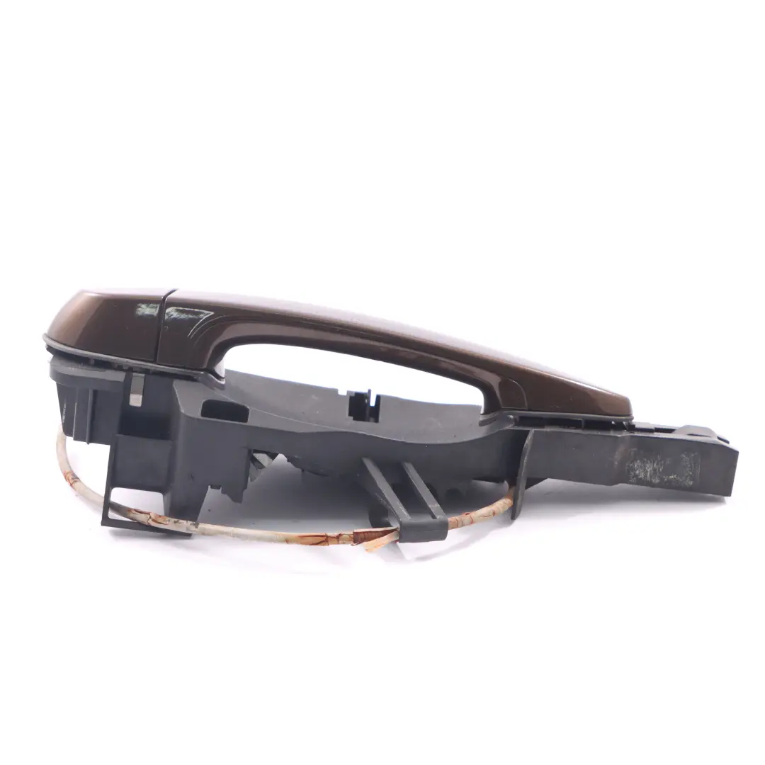 Tirador Puerta Trasera Izquierda Agarre Marrakesh Marrón - B09 para BMW X1 E84 con número de pieza 2992975 BMW X1 E84 Tirador Puerta Trasera Izquierda Agarre Marrakesh Marrón - B09 - SKU 2992975-MBR - Número de pieza 2992975