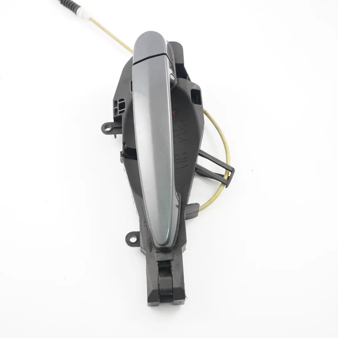 Tirador Puerta Trasera Derecha Agarre Exterior Gris Mineral B39 para BMW X1 E84 con número de pieza 2992976 BMW X1 E84 Tirador Puerta Trasera Derecha Agarre Exterior Gris Mineral B39 - SKU 2992976-MG - Número de pieza 2992976
